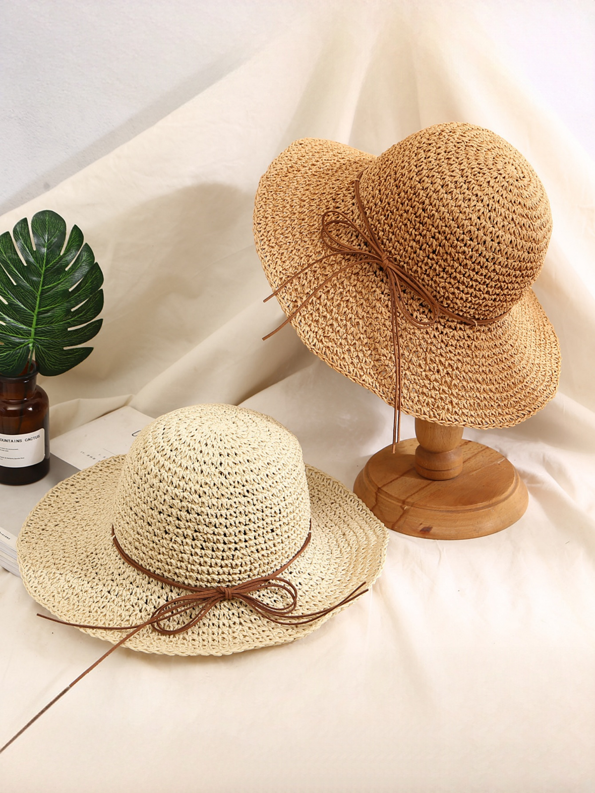 Wide-brimmed Straw Hat With Bow