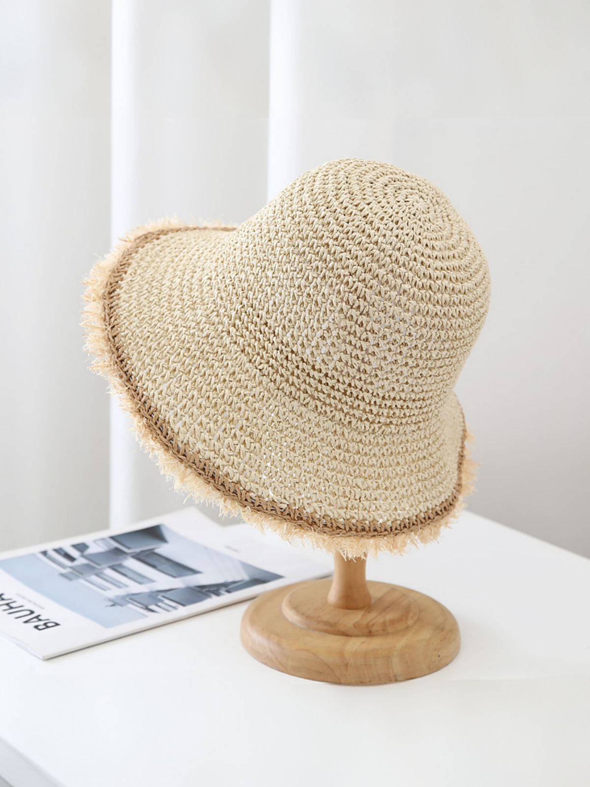 Wide-brimmed, Frayed Woven Straw Hat