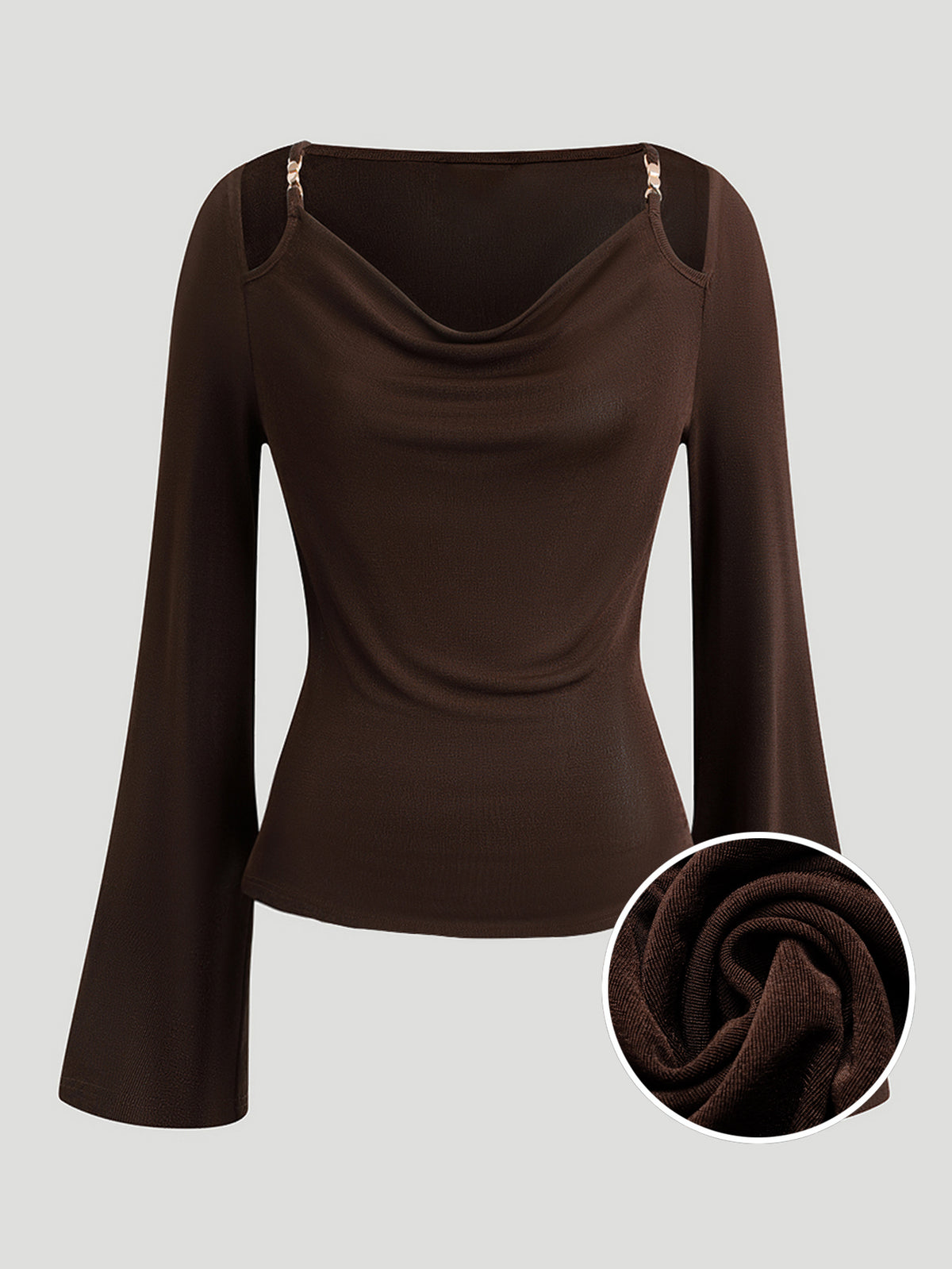 A Fitted Long-sleeved Top With A Flared Neckline And Metallic Shoulder Embellishments.
