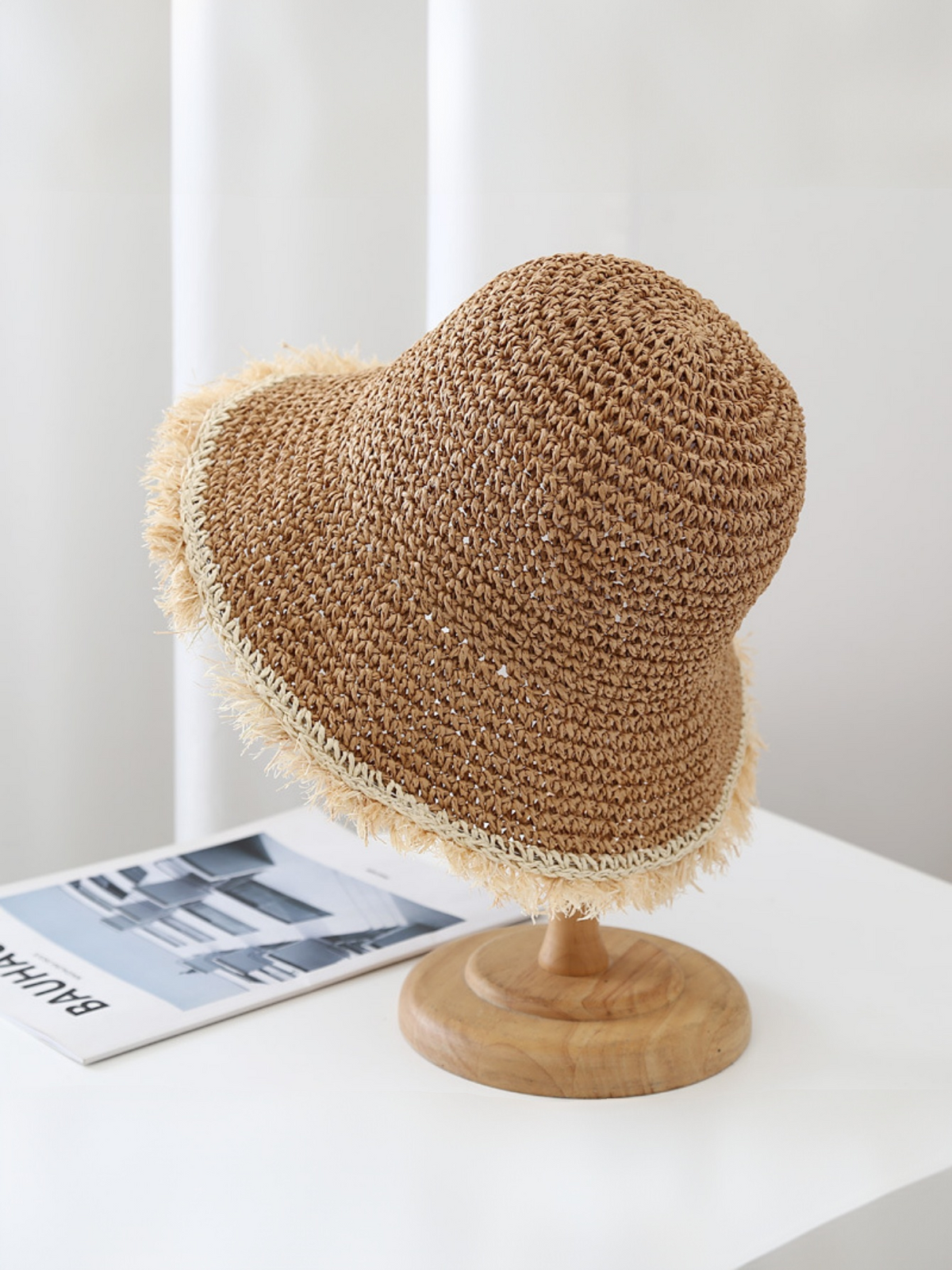 Wide-brimmed, Frayed Woven Straw Hat