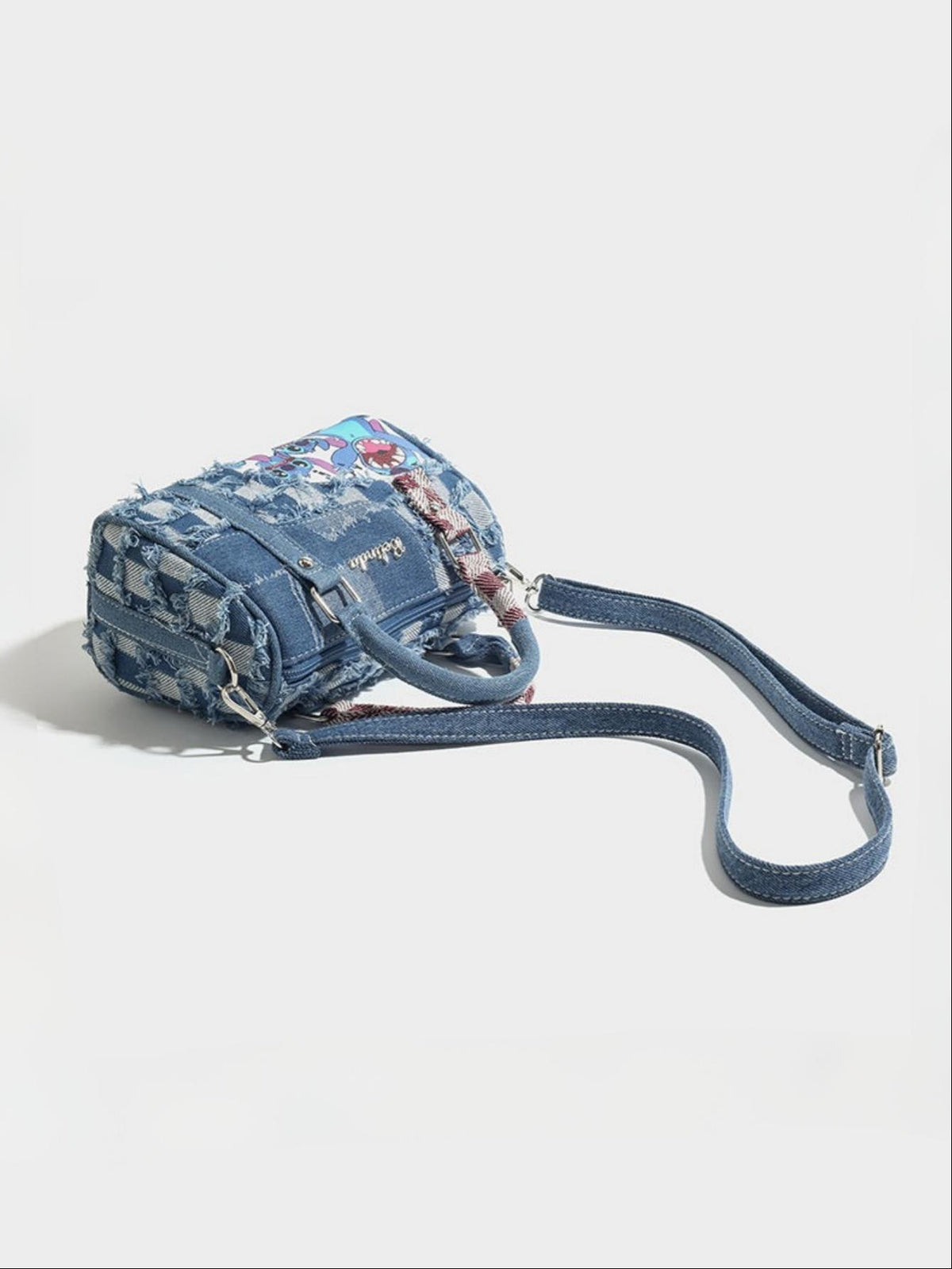 Stitch-themed Denim Patchwork Handbag