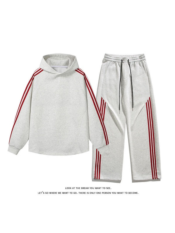 Set aus farblich abgesetzten Streifen, geraden Hosen und Kapuzenpullover