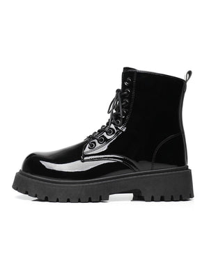 Glänzende schwarze Martin-Stiefel