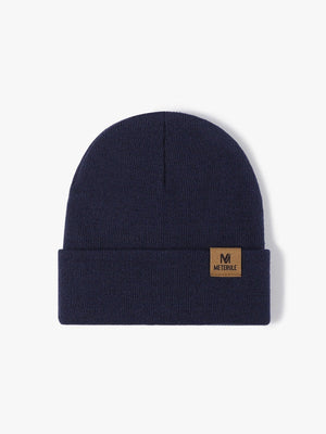 Mütze mit Buchstabenetikett
