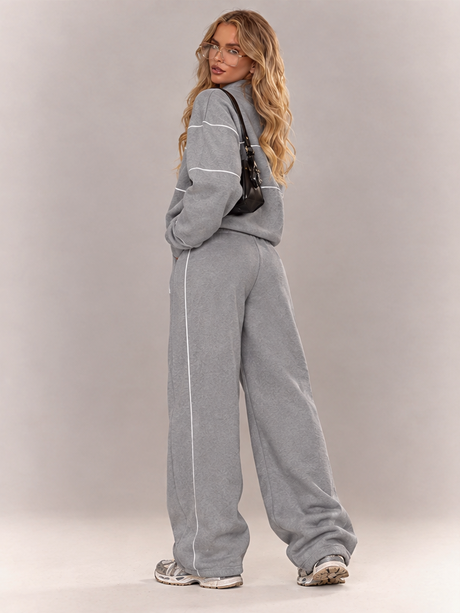 Ensemble deux pièces décontracté : sweat-shirt à manches longues sans capuche et pantalon.