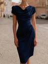 A Midi Dress With A Ruffled Neckline And A Fitted, Bodycon Silhouette.
