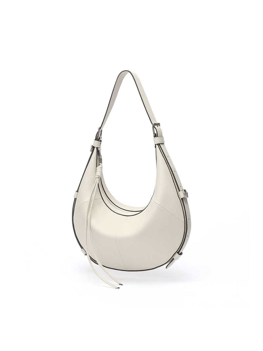 A Small, Sleek Hobo Bag In Vegetable-tanned Top-grain Cowhide, Perfect For Crossbody Or Commuting, Featuring A Summery Crescent Shape, Suitable For Women's Shoulder Or Underarm Wear.