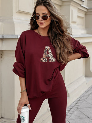 Ensemble deux pièces décontracté : sweat-shirt à capuche, pantalon moulant à imprimé lettres