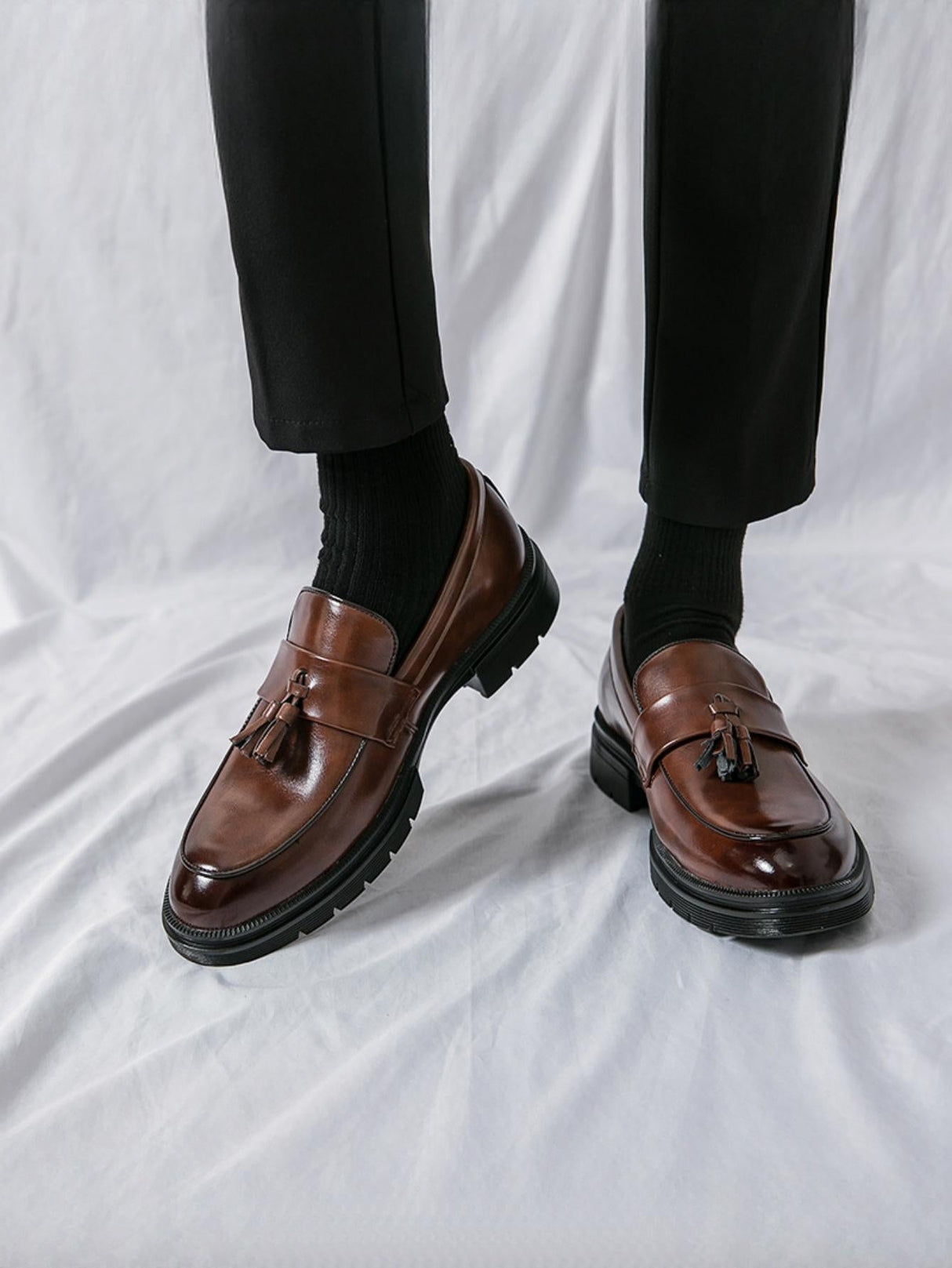 Mocassins à plateforme et à pompons