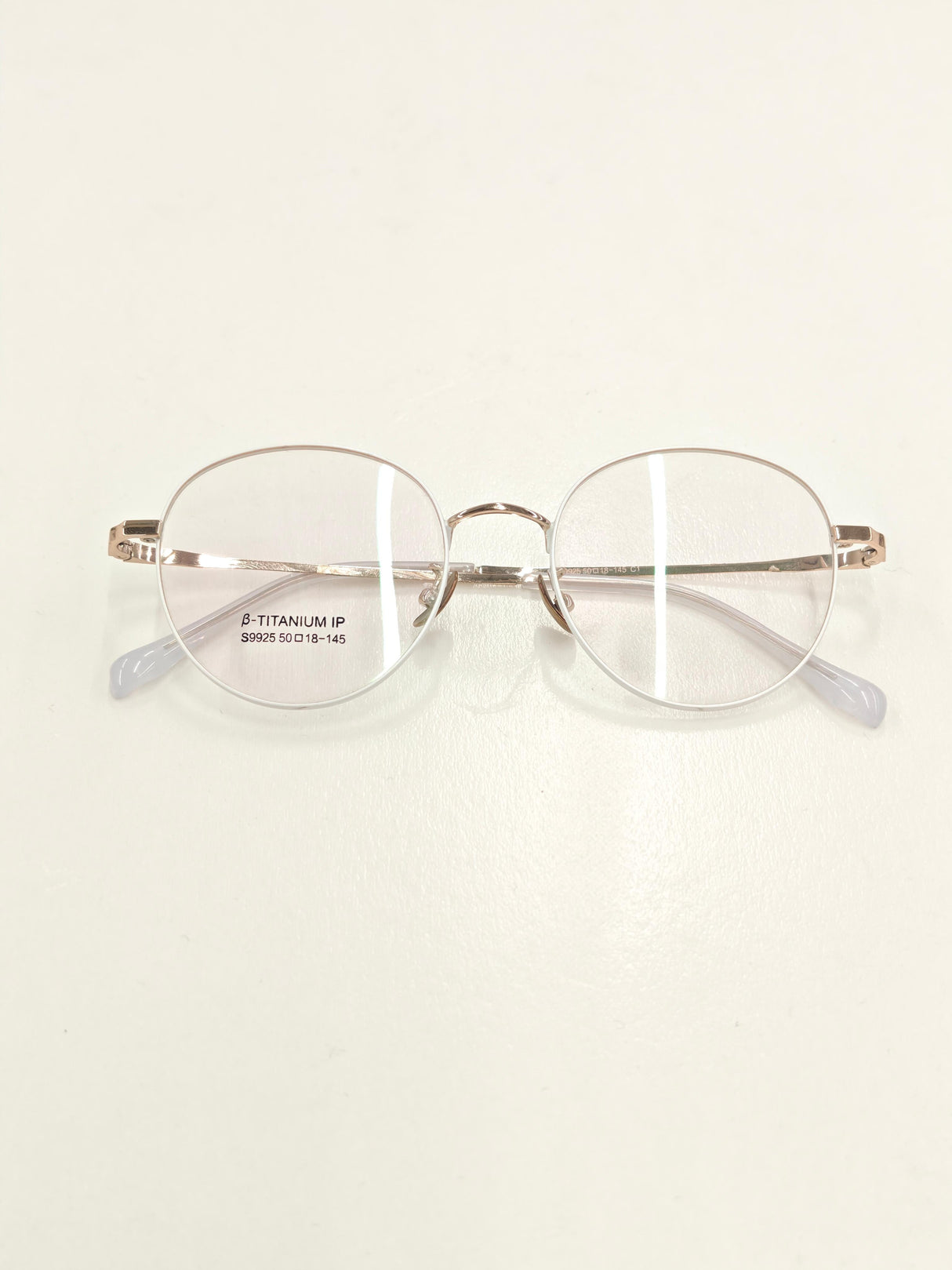 White-framed Gold Eyeglasses