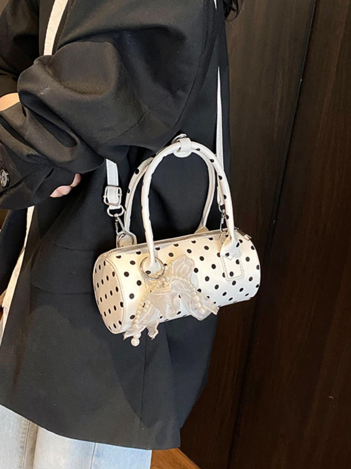 Sac à main cylindrique à pois color-block