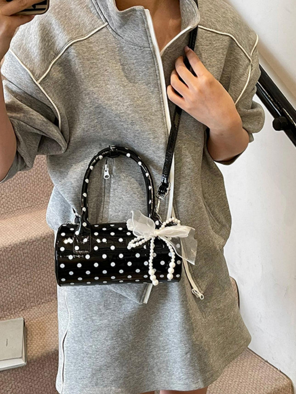 Sac à main cylindrique à pois color-block