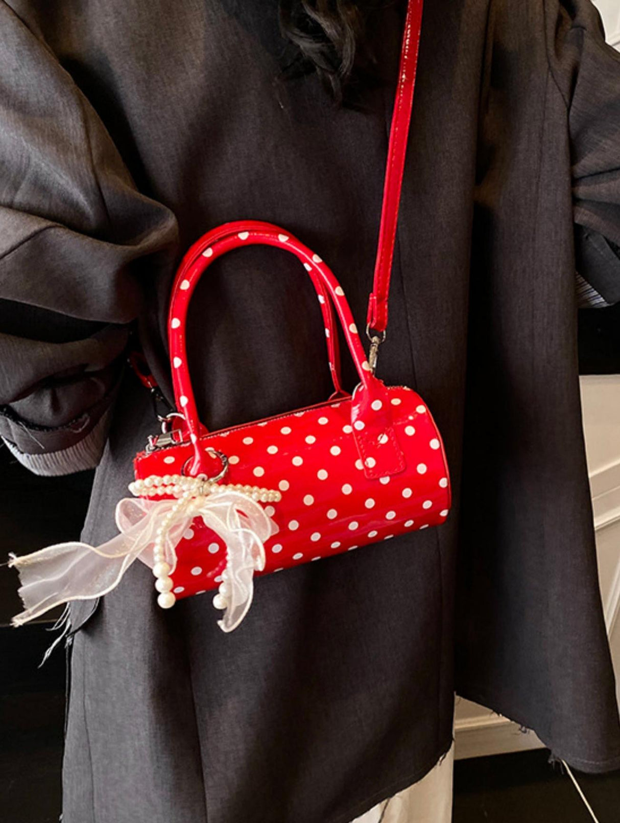 Sac à main cylindrique à pois color-block