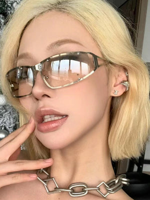 Lunettes de soleil élégantes ajourées