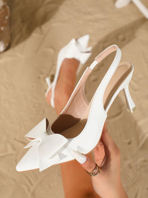 Escarpins à dos ouvert avec nœud papillon