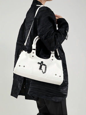 It's A Chain-studded Handbag.