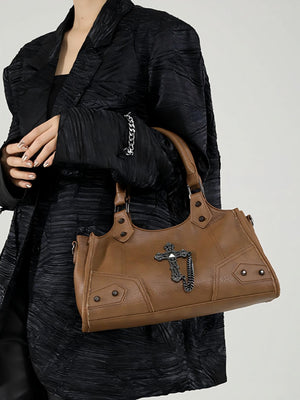 It's A Chain-studded Handbag.