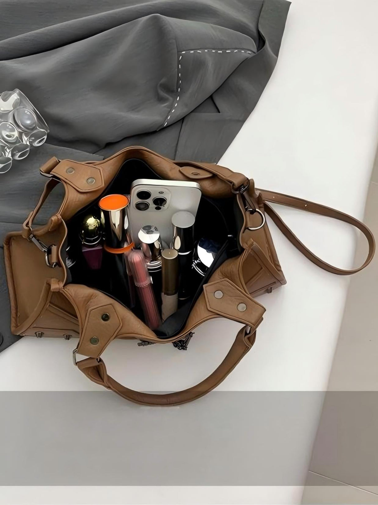 It's A Chain-studded Handbag.