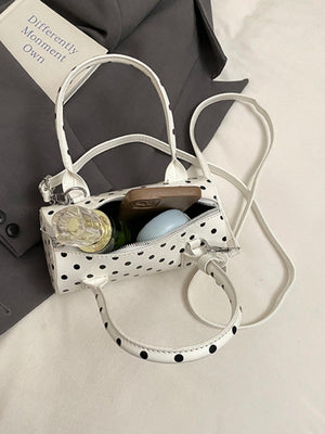 Sac à main cylindrique à pois color-block