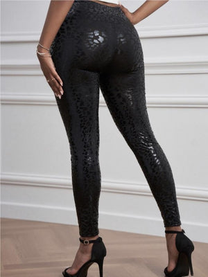 Pantalon taille haute en cuir PU stretch, coupe moulante, effet push-up