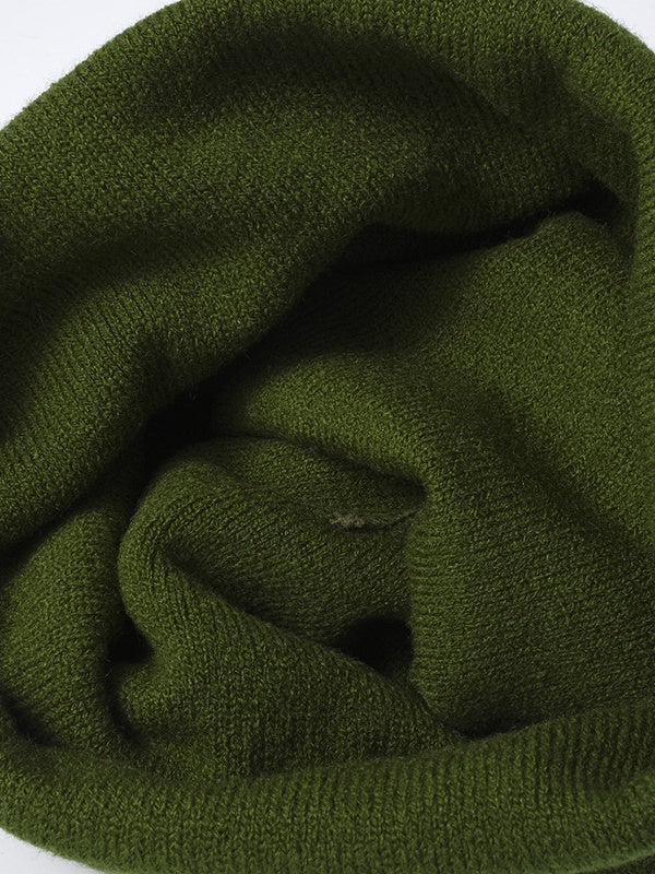 Bonnet jacquard à empiècements et pompon extensible