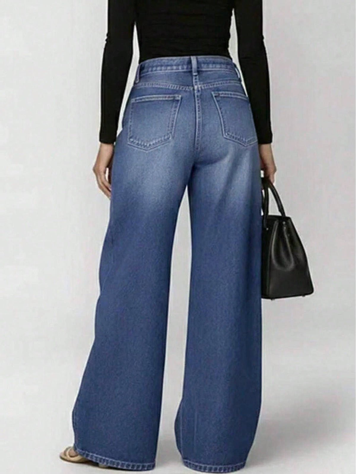 High-waisted, Loose-fitting Jeans With Metal Perforations