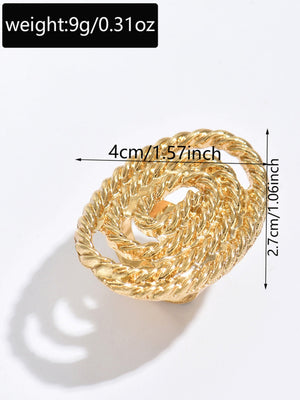 A Ring With An Exaggerated Design Inspired By Conch Shells And Starfish.