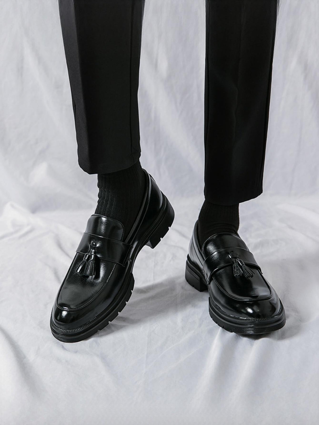 Mocassins à plateforme et à pompons