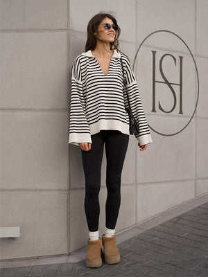 Black Striped Sweater With Collar, Long Sleeves, Loose Fit, Pullover Style.