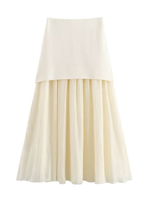 Ensemble deux pièces : gilet à col en V et boutons dorés, jupe plissée