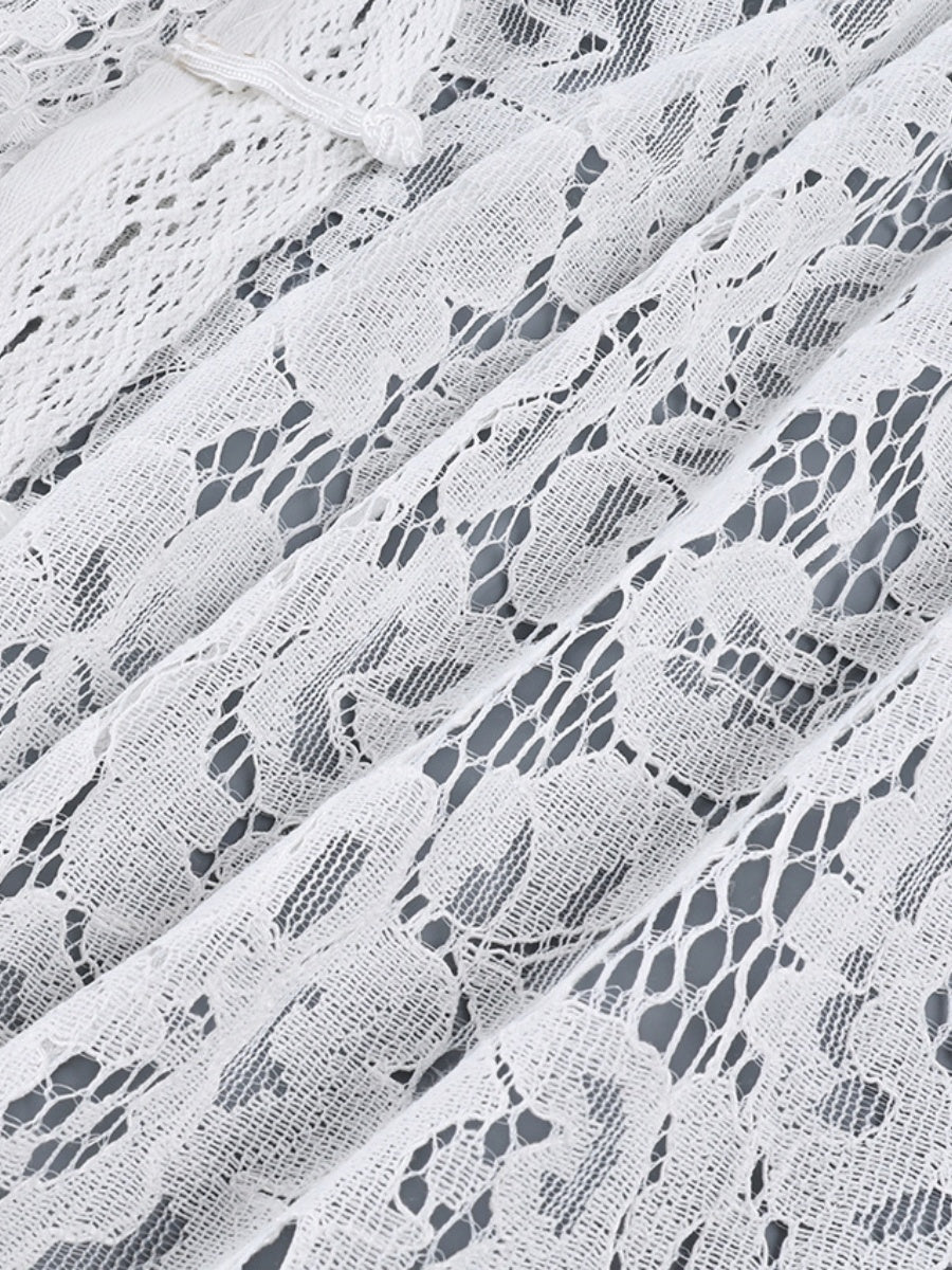 Haut transparent à col montant en dentelle crochetée et coupe ajustée, manches longues