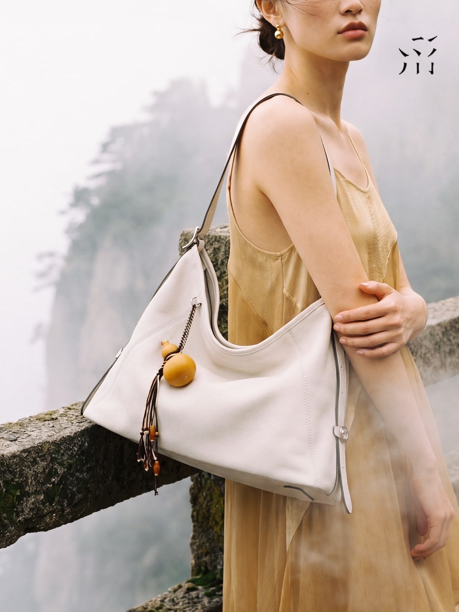 A Glimpse Of The Hobo Small-sized, Elegant Vegetable-tanned Calfskin Shoulder/crossbody Bag For Spring.