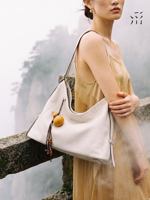 A Glimpse Of The Hobo Small-sized, Elegant Vegetable-tanned Calfskin Shoulder/crossbody Bag For Spring.