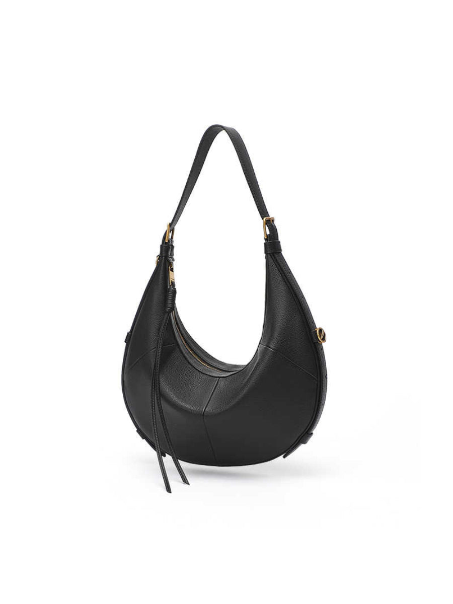 A Small, Sleek Hobo Bag In Vegetable-tanned Top-grain Cowhide, Perfect For Crossbody Or Commuting, Featuring A Summery Crescent Shape, Suitable For Women's Shoulder Or Underarm Wear.