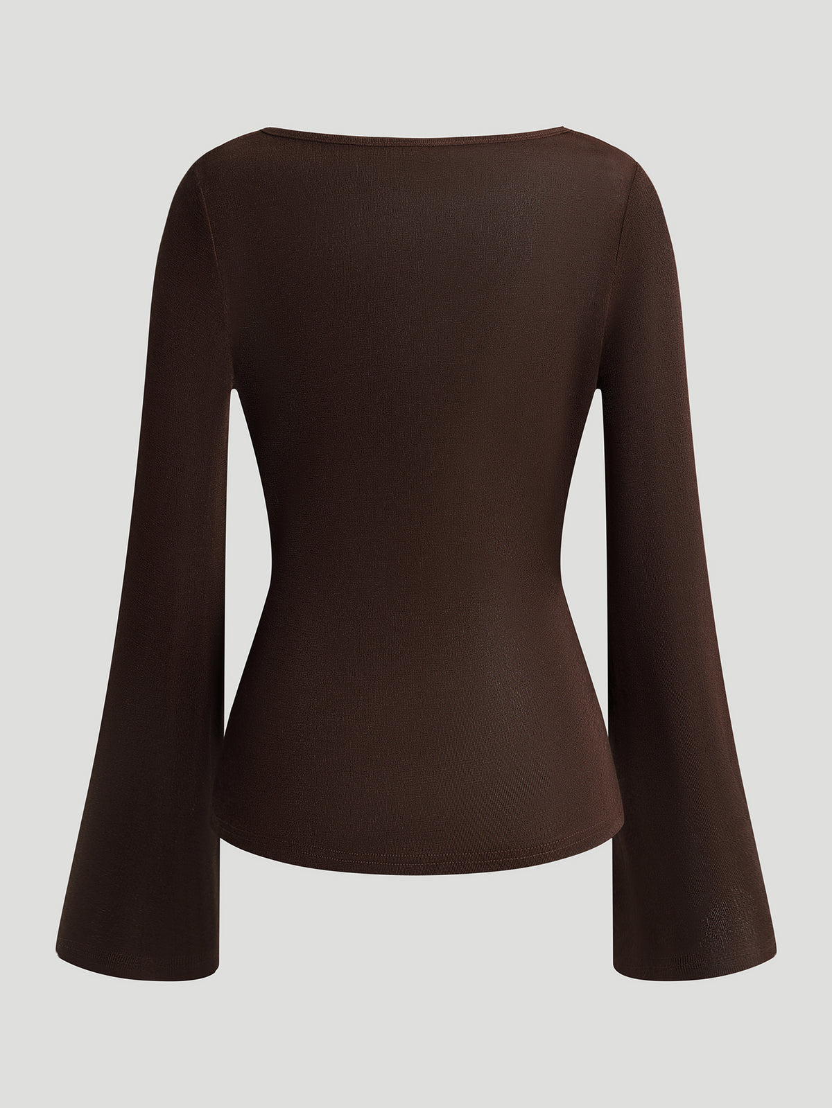 A Fitted Long-sleeved Top With A Flared Neckline And Metallic Shoulder Embellishments.