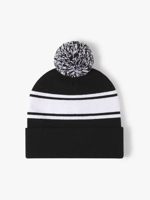 Bonnet jacquard à empiècements et pompon extensible