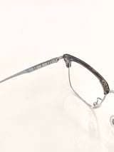 Lunettes argentées transparentes