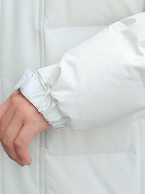 Manteau long à capuche et épais en duvet