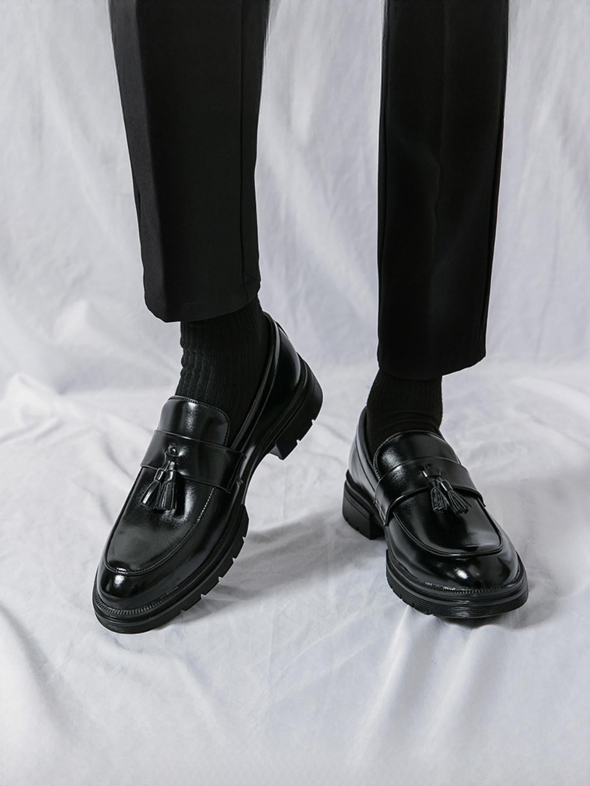 Mocassins à plateforme et à pompons